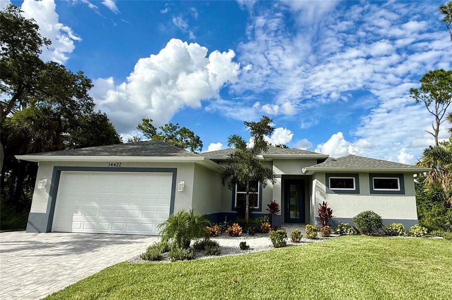 Front exterior of a new home in , Port Charlotte, FL, highlighting curb appeal (Image 26).