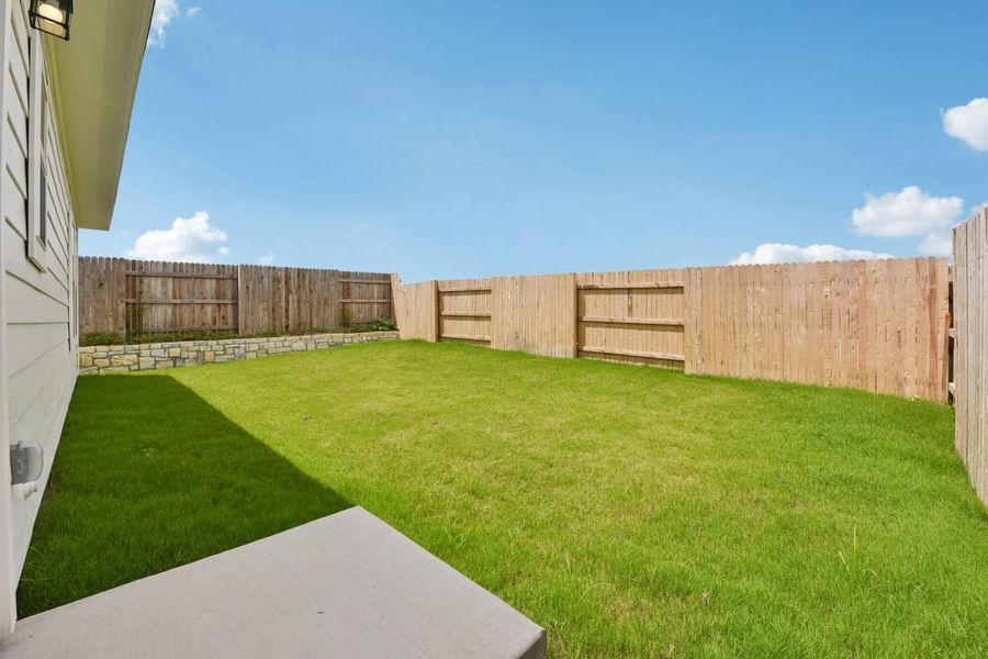 Exterior details and patio area of a home in Edgebrooke, Pflugerville (Image 3).