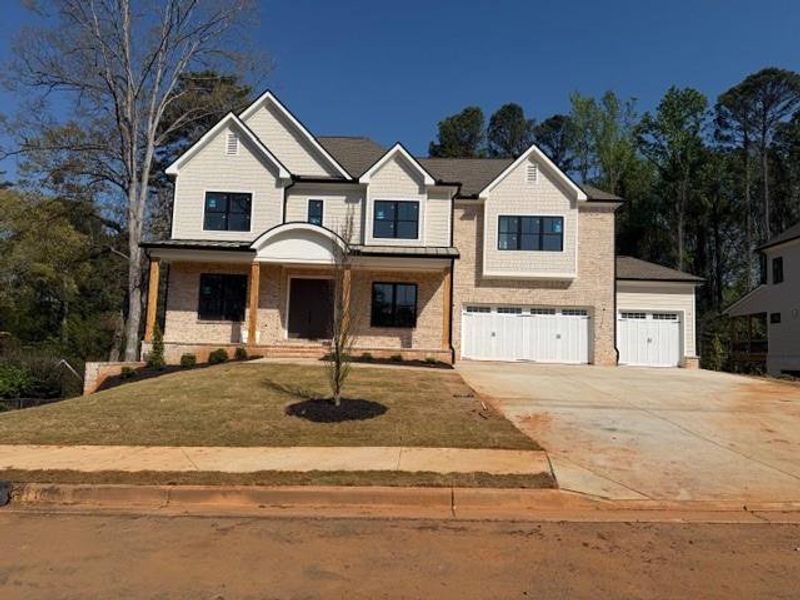 Front exterior of a new home in , Atlanta, GA, highlighting curb appeal (Image 23).