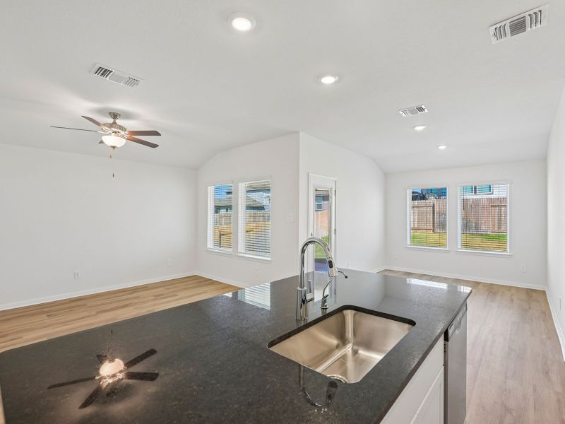 Furnished interior view inside a new home in Creekfall, Burnet (Image 6).