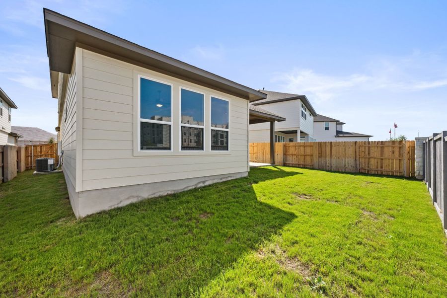 Exterior details and patio area of a home in Park Central, Georgetown (Image 26).