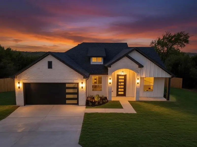 Front exterior of a new home in , Granbury, TX, highlighting curb appeal (Image 2). Front exterior of a new home in , Granbury, TX, highlighting curb appeal (Image 2).