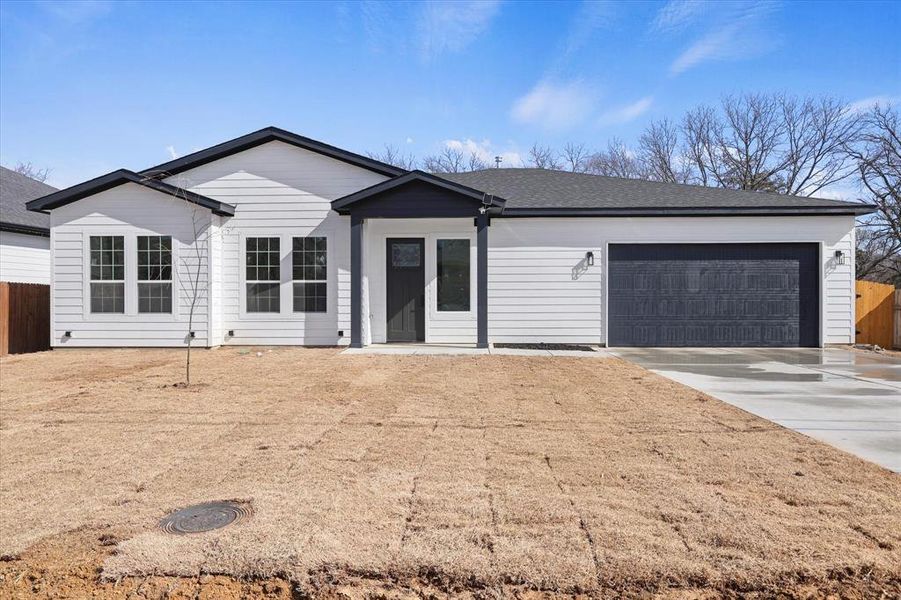 Front exterior of a new home in , Dallas, TX, highlighting curb appeal (Image 1). Front exterior of a new home in , Dallas, TX, highlighting curb appeal (Image 1).