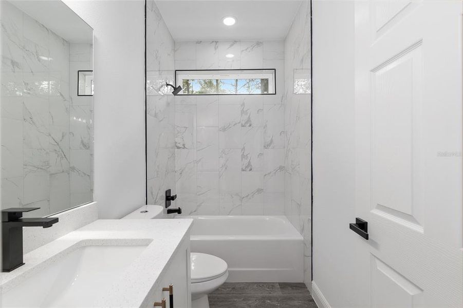 Furnished interior view inside a new home in , Dunnellon (Image 16).