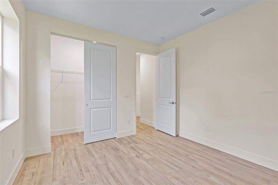 Spacious, unfurnished interior of a new home in , New Smyrna Beach (Image 38).