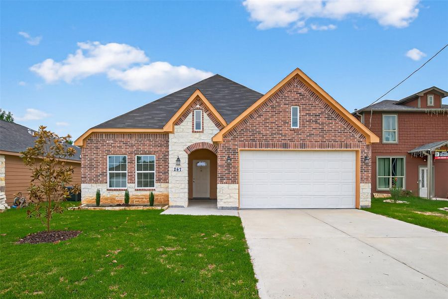 Front exterior of a new home in , Cleveland, TX, highlighting curb appeal (Image 2). Front exterior of a new home in , Cleveland, TX, highlighting curb appeal (Image 2).