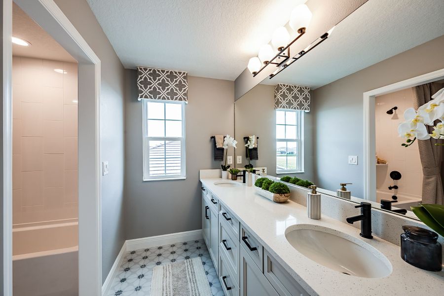 Representative furnished interior of a home built from the Pelican by Homes by WestBay in Crosswind Ranch, Parrish (Image 43).