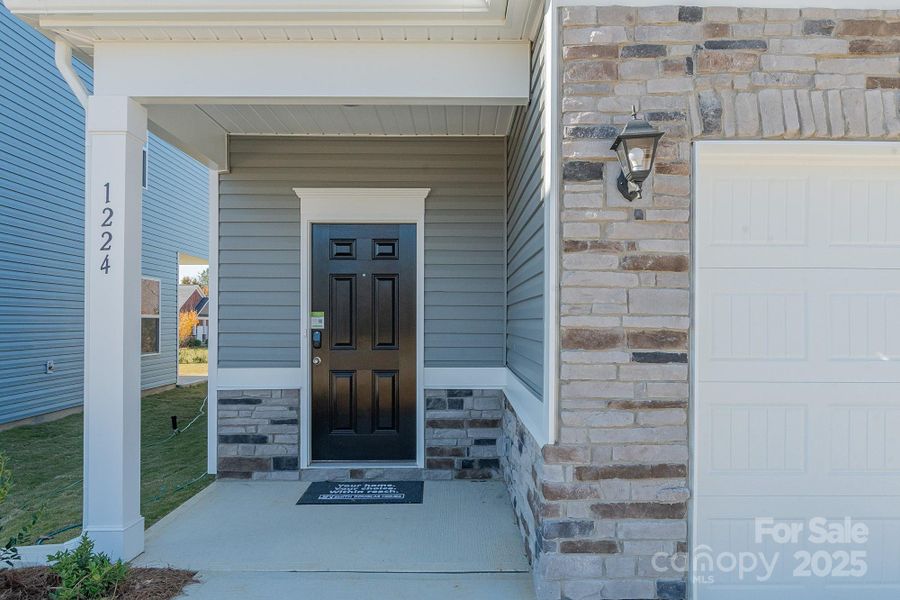 Exterior details and patio area of a home in Country Club Village, Salisbury (Image 20). Exterior details and patio area of a home in Country Club Village, Salisbury (Image 20).
