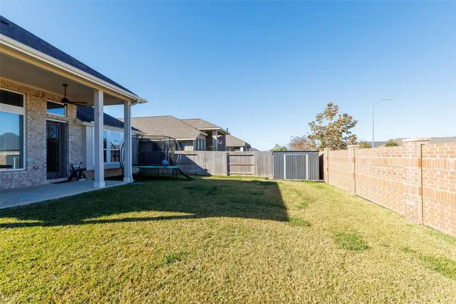 Exterior details and patio area of a home in Amira: Heritage Collection, Tomball (Image 3).