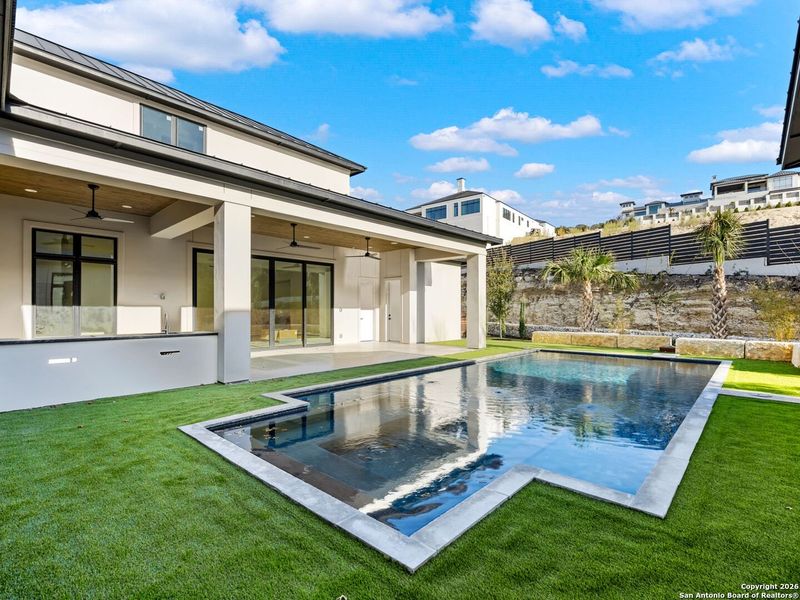 Exterior details and patio area of a home in , San Antonio (Image 20).