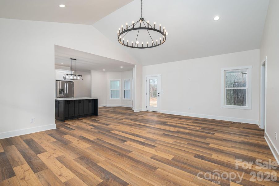 Looking from front door to back of house.  This is the oversized vaulted ceiling living room