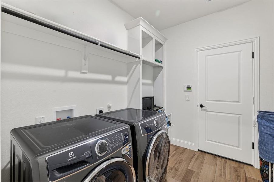 Furnished interior view inside a new home in , Little Elm (Image 29).