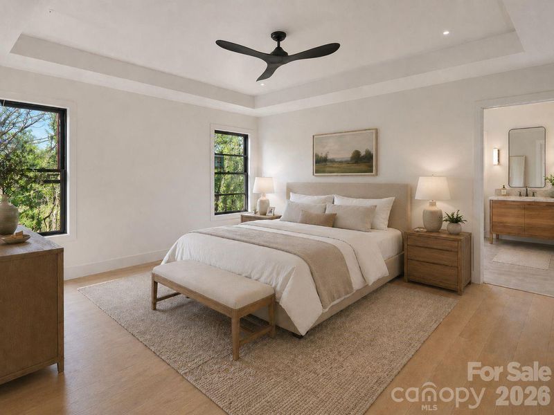 Primary bedroom with ensuite bathroom. (Virtually Staged)