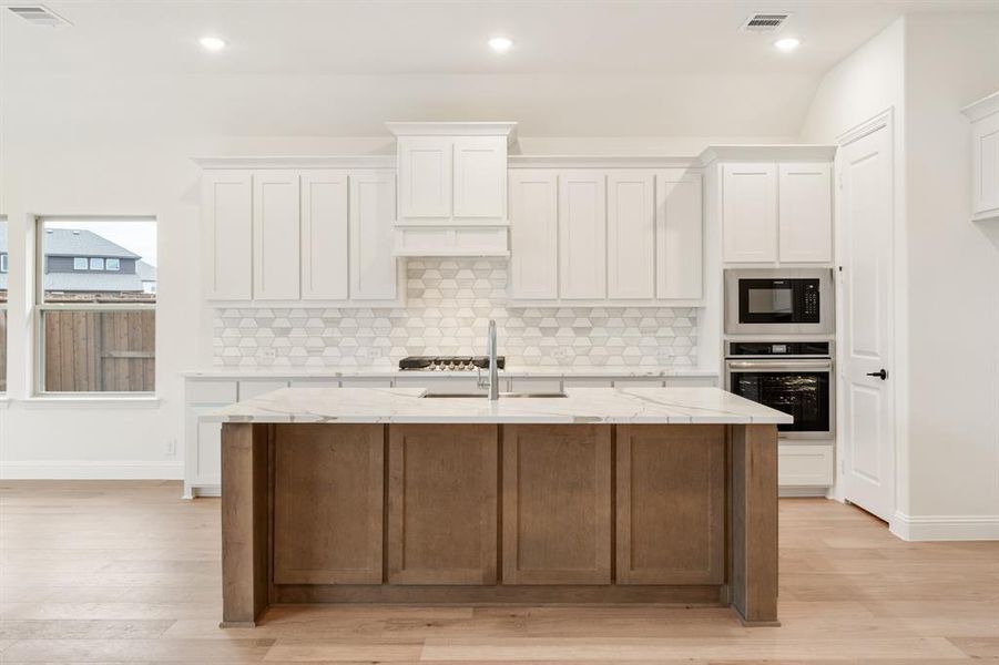 Furnished interior view inside a new home in Windsong Ranch Classic 61, Prosper (Image 10).