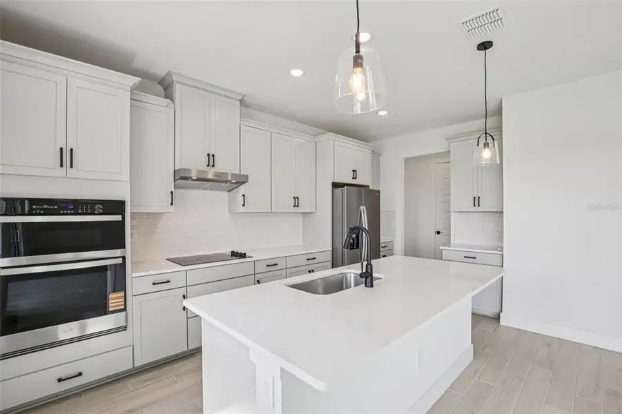 Furnished interior view inside a new home in Magnolia Bay - Reserve Series, Nokomis (Image 7).