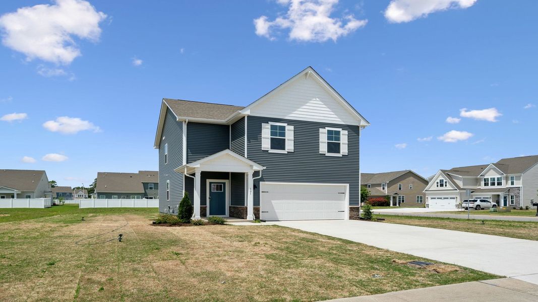 Representative exterior photo of a completed home built from the Pine by D.R. Horton in Tooley Harbor, Elizabeth City, NC (Image 21).