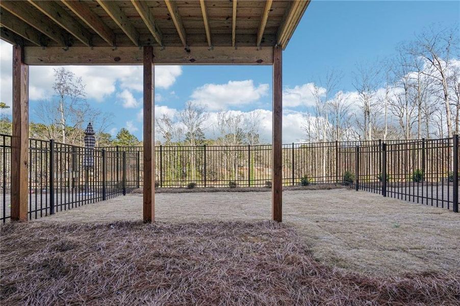 Exterior details and patio area of a home in Millcroft Townhomes, Buford (Image 25). Exterior details and patio area of a home in Millcroft Townhomes, Buford (Image 25).