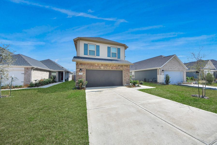 Front exterior of a new home in Marisol, Katy, TX, highlighting curb appeal (Image 23). Front exterior of a new home in Marisol, Katy, TX, highlighting curb appeal (Image 23).