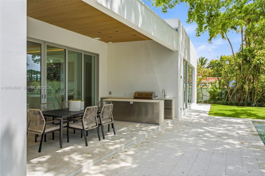 Exterior details and patio area of a home in , Miami Springs (Image 1). Exterior details and patio area of a home in , Miami Springs (Image 1).