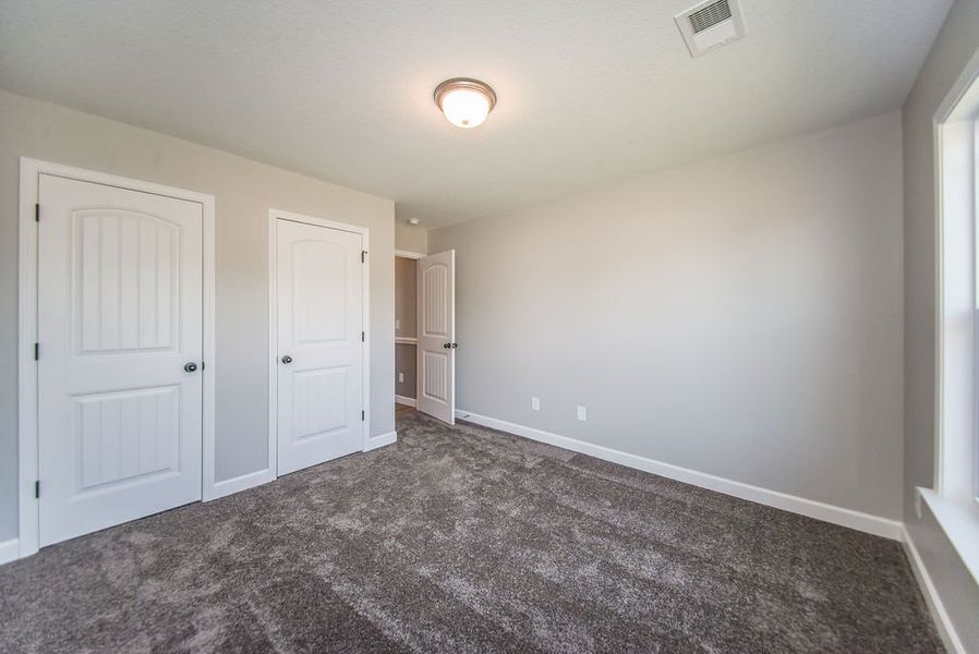 Representative unfurnished interior of a home built from the Archer by Enchanted Homes in Lonesome Dove, San Antonio (Image 39).