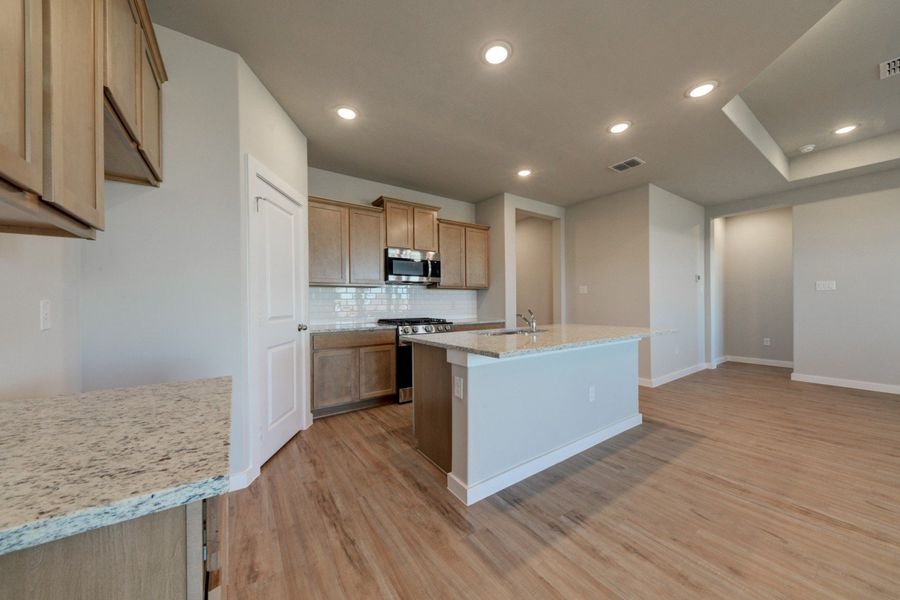 Representative furnished interior of a home built from the Sophora by Hakes Brothers in Hickory Ridge Estates, Elmendorf (Image 5). Representative furnished interior of a home built from the Sophora by Hakes Brothers in Hickory Ridge Estates, Elmendorf (Image 5).