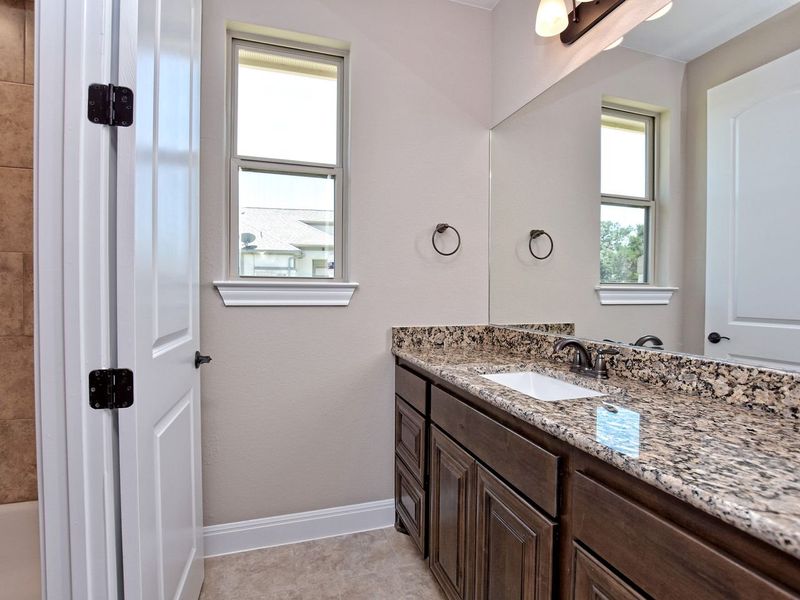 Representative furnished interior of a home built from the San Simeon I by Giddens Homes in Clearwater Ranch, Liberty Hill (Image 268).