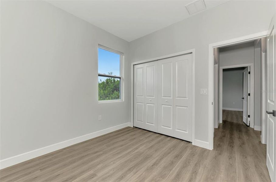 Spacious, unfurnished interior of a new home in , Port Charlotte (Image 25).