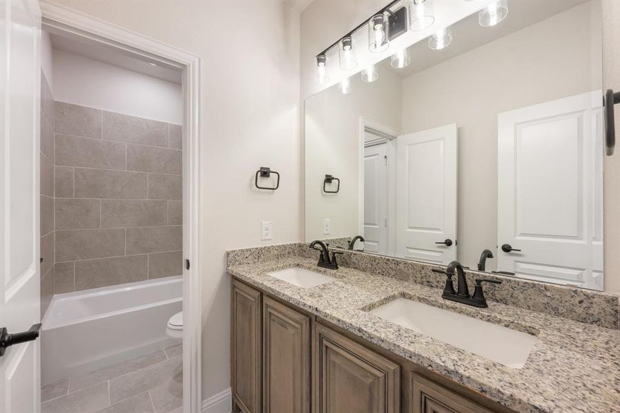 Furnished interior view inside a new home in Coyote Crossing, Godley (Image 7).