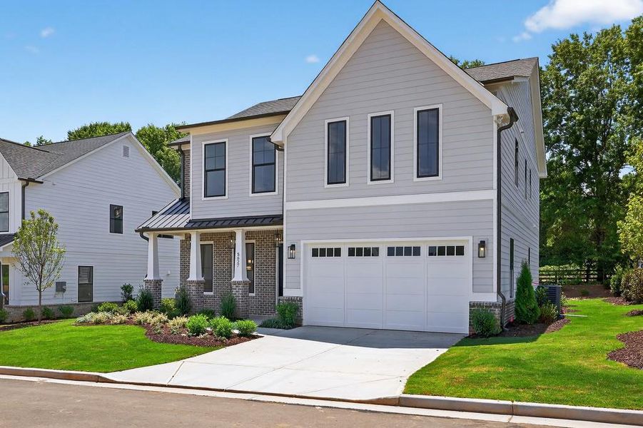 Front exterior of a new home in Livingstone Park, Kennesaw, GA, highlighting curb appeal (Image 27).