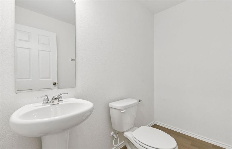 Convenient half bath for guests Convenient half bath for guests