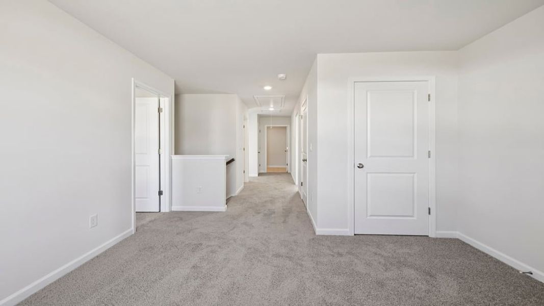 Spacious, unfurnished interior of a new home in Waverly Station, Greenwood (Image 27).