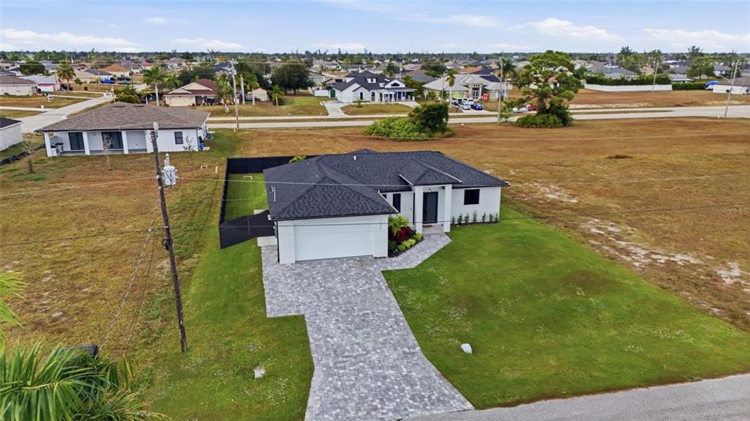 Front exterior of a new home in , Cape Coral, FL, highlighting curb appeal (Image 28).