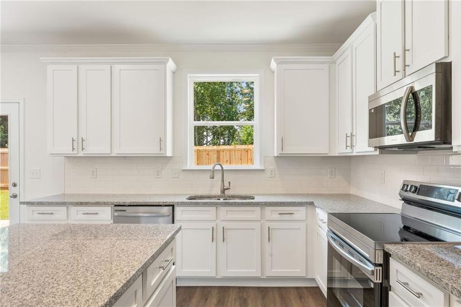 Furnished interior view inside a new home in Clark Farms, Flowery Branch (Image 8).
