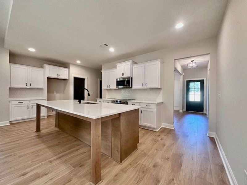 Furnished interior view inside a new home in Deer Creek, Moreland (Image 3).