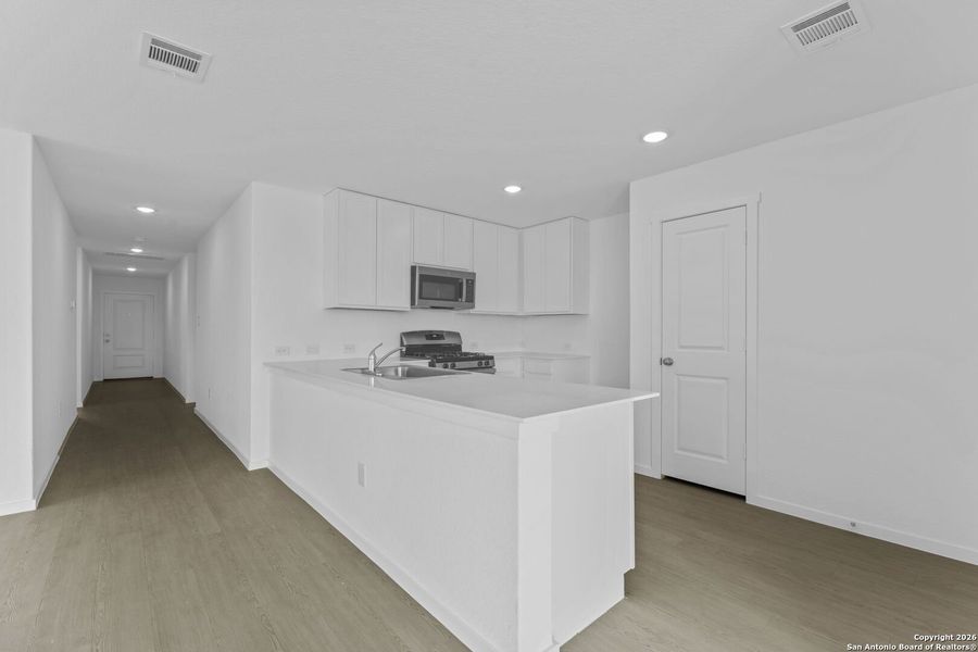 Furnished interior view inside a new home in Voss Farms, New Braunfels (Image 5).