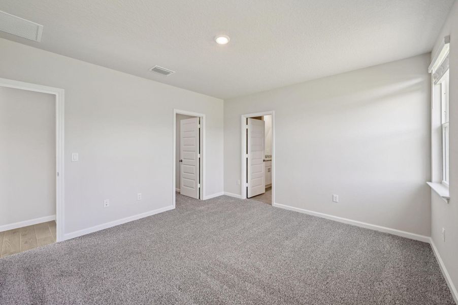 Spacious, unfurnished interior of a new home in Hampton Park - Classic Series, Vero Beach (Image 9). Spacious, unfurnished interior of a new home in Hampton Park - Classic Series, Vero Beach (Image 9).
