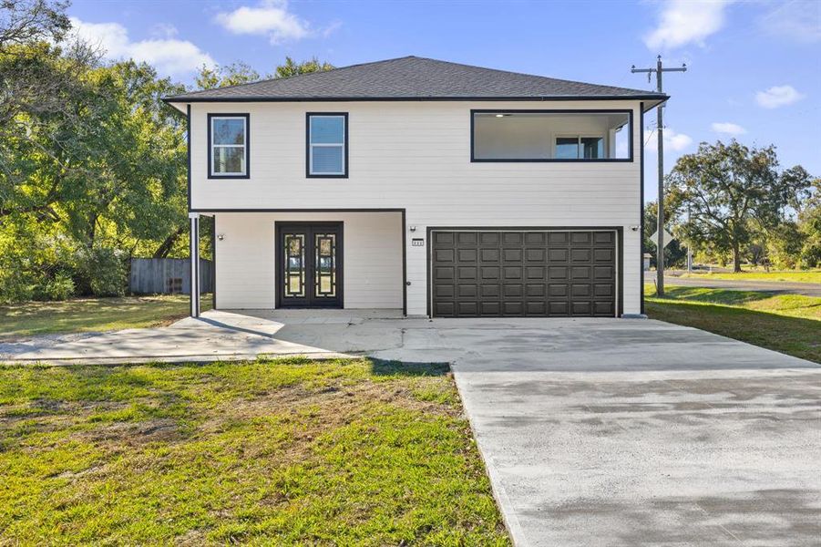 Front exterior of a new home in , Pecan Gap, TX, highlighting curb appeal (Image 1).