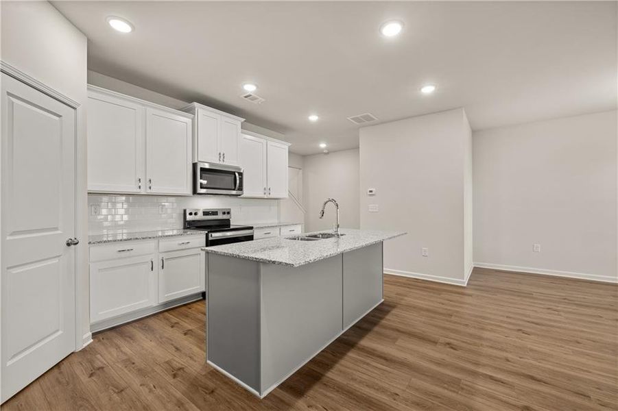 Furnished interior view inside a new home in Lake Carlton, Loganville (Image 10).