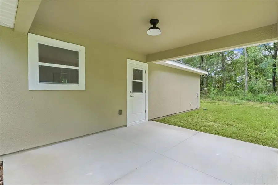 Exterior details and patio area of a home in , Ocklawaha (Image 16). Exterior details and patio area of a home in , Ocklawaha (Image 16).