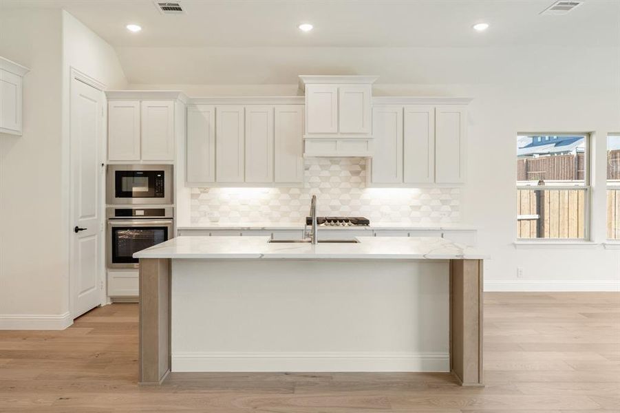 Furnished interior view inside a new home in Windsong Ranch Classic 61, Prosper (Image 8). Furnished interior view inside a new home in Windsong Ranch Classic 61, Prosper (Image 8).