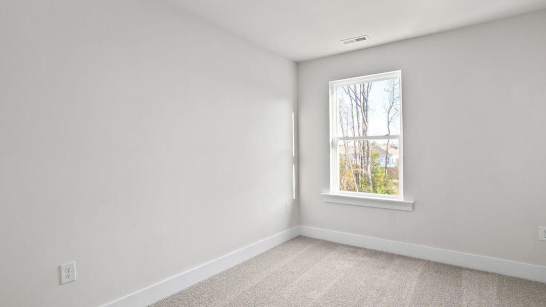 Spacious, unfurnished interior of a new home in Townes at Seabrooke, Leland (Image 25).