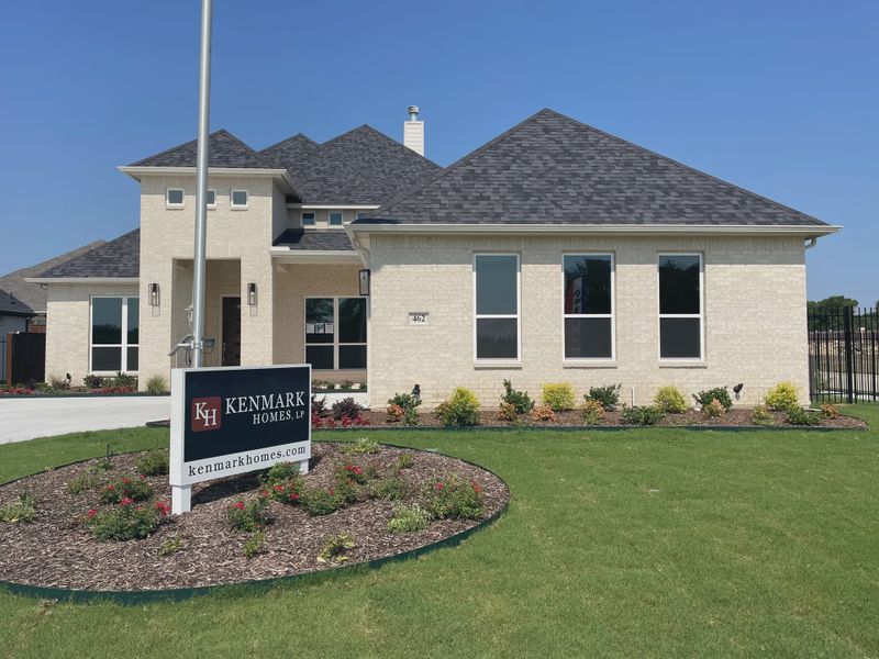 Front exterior of a new home in LeTara, Haslet, TX, highlighting curb appeal (Image 2). Front exterior of a new home in LeTara, Haslet, TX, highlighting curb appeal (Image 2).