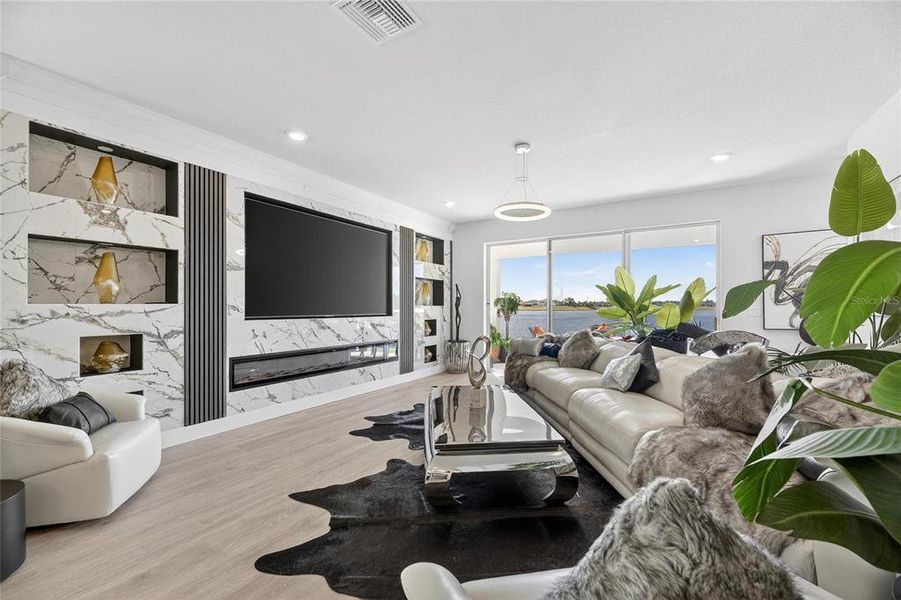 Furnished interior view inside a new home in The Peninsula at Rhodine Lake, Riverview (Image 27).
