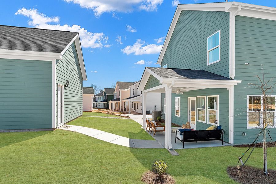 Exterior details and patio area of a home in Six Oaks, Summerville (Image 15).
