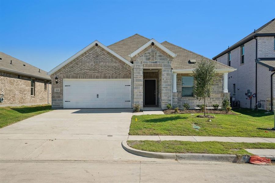 Front exterior of a new home in Stonehaven, Seagoville, TX, highlighting curb appeal (Image 1). Front exterior of a new home in Stonehaven, Seagoville, TX, highlighting curb appeal (Image 1).