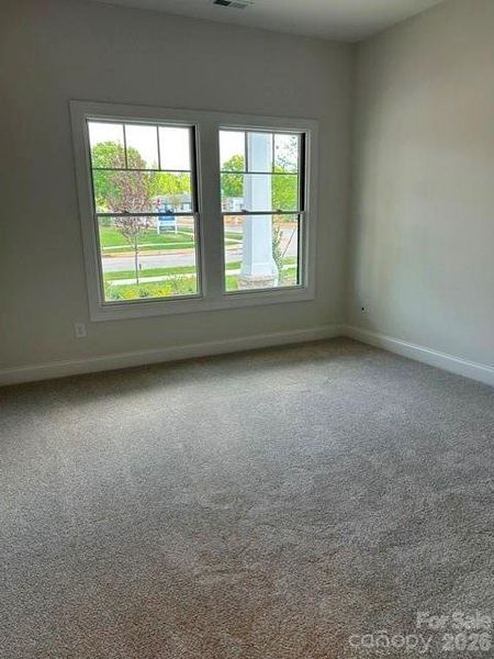 Spacious, unfurnished interior of a new home in The Courtyards at Hodges Farm, Charlotte (Image 11).