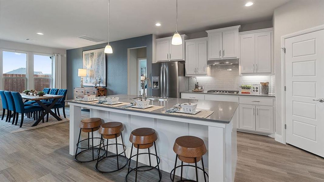 Kitchen - All Home and community information, including pricing, included features, terms, availability and amenities, are subject to change at any time without notice or obligation. All Drawings, pictures, photographs, video, square footages, floor plans, elevations, features, colors and sizes are approximate for illustration purposes only and will vary from the homes as built.