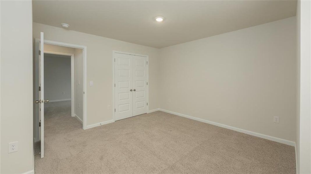 Spacious, unfurnished interior of a new home in Brooks Station, Dacula (Image 24).