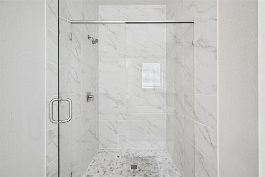 Bathroom with an enclosed shower