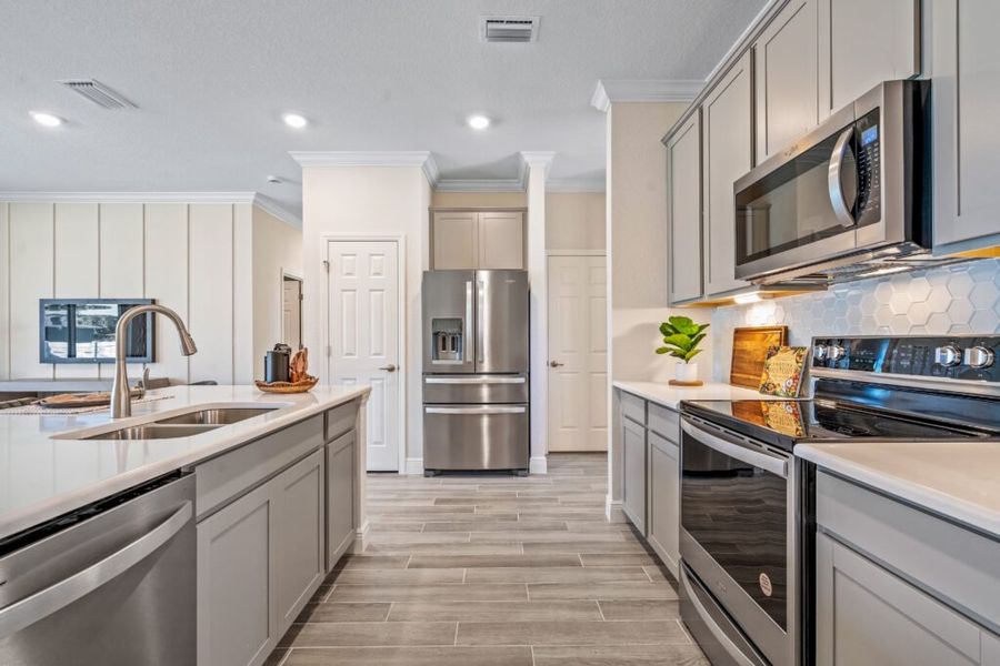 Representative furnished interior of a home built from the Siesta by Holiday Builders in Palm Bay, Palm Bay (Image 10).